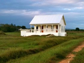 Carmelita Gardens house with porch in rural Cayo District – Best Places In The World To Retire – International Living